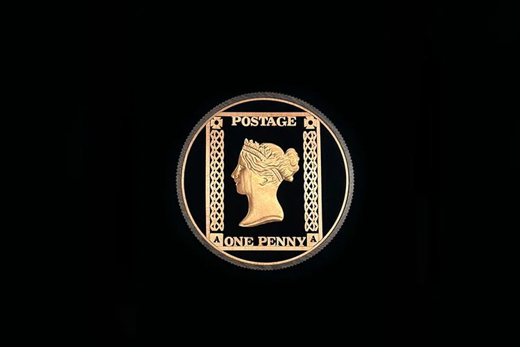 Circular gilded penny postage stamp artwork with Queen Victoria profile